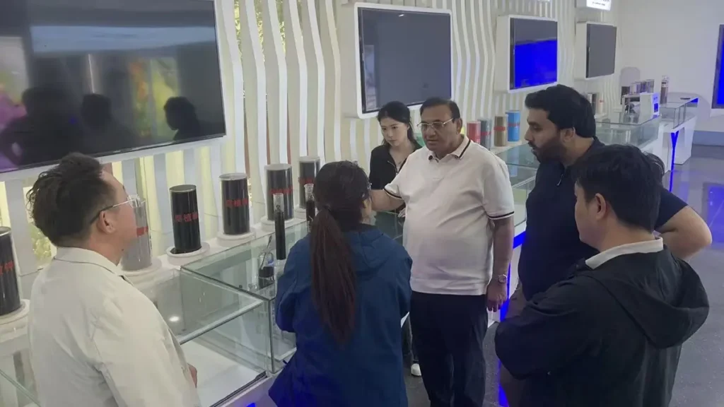 Risso Fertilizer team explaining liquid- fertilizer technology and product applications to visiting Pakistani customers.